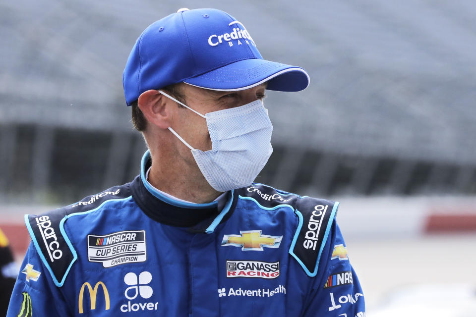 Matt Kenseth waits for the start of the NASCAR Cup Series auto race Sunday, May 17, 2020, in Darlington, S.C. (AP Photo/Brynn Anderson)