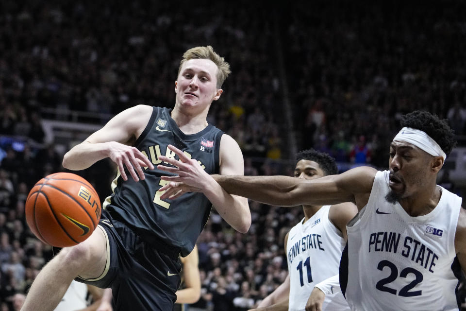 Purdue guard Fletcher Loyer (2) is fouled on a fast break by Penn State guard Jalen Pickett (22) during the second half of an NCAA college basketball game in West Lafayette, Ind., Wednesday, Feb. 1, 2023. Purdue defeated Penn State 80-60. (AP Photo/Michael Conroy)