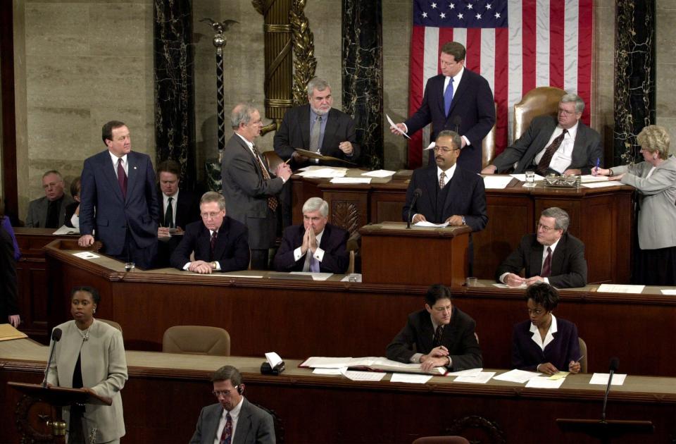 Rep. Cynthia McKinney, D-Ga., lower left, objects to Florida's electoral vote count results, which delivered a loss to Vice President Al Gore, standing, top center, at the U.S. House of Representatives on Jan. 6, 2001. Congress formally anointed George W. Bush as the victor in the previous year's achingly close and bitterly contested presidential election.