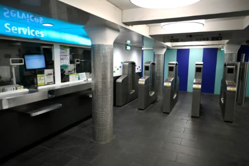 Metro turnstiles were left open at the Les Halles station, normally a bustling commuter hub, during the Paris metro strike on Friday