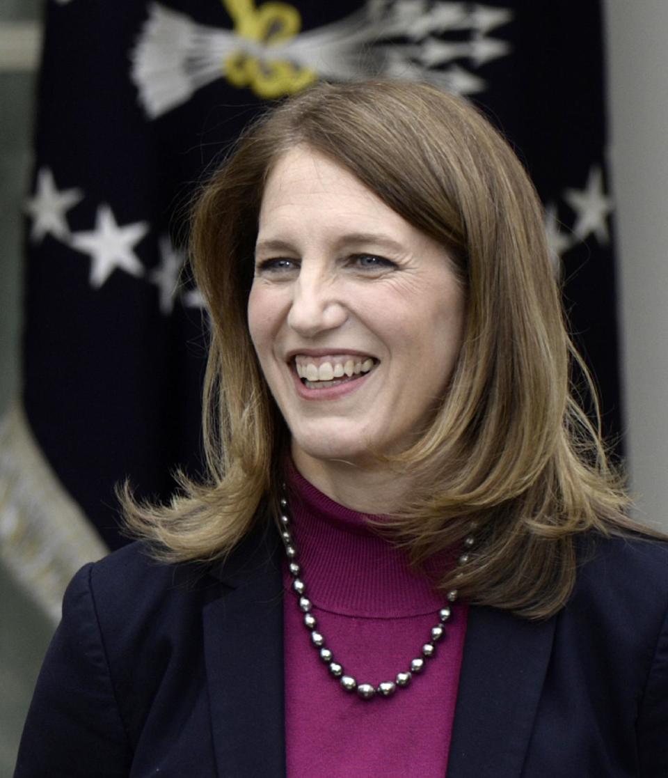 Current Budget Director Sylvia Mathews Burwell, President Barack Obama's nominee to become Health and Human Services Secretary, smiles in the Rose Garden of the White House in Washington, Friday, April 11, 2014, where President Barack Obama made the announcement. (AP Photo/Susan Walsh)