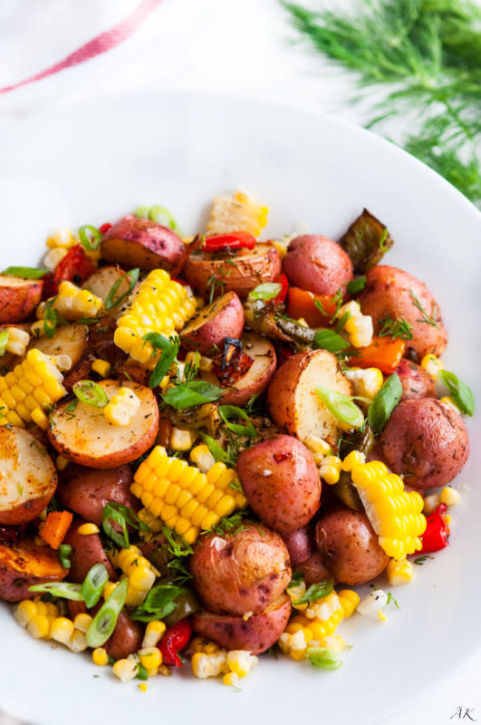 <p>Aberdeen's Kitchen</p><p>This Southwest roasted red potato salad is a one-pan meal that's tasty, fresh and easy!</p><p><strong>Get the recipe: <a href="https://www.aberdeenskitchen.com/2016/05/southwest-roasted-potato-salad/" rel="nofollow noopener" target="_blank" data-ylk="slk:Southwest Roasted Red Potato Salad;elm:context_link;itc:0;sec:content-canvas" class="link ">Southwest Roasted Red Potato Salad</a></strong></p>