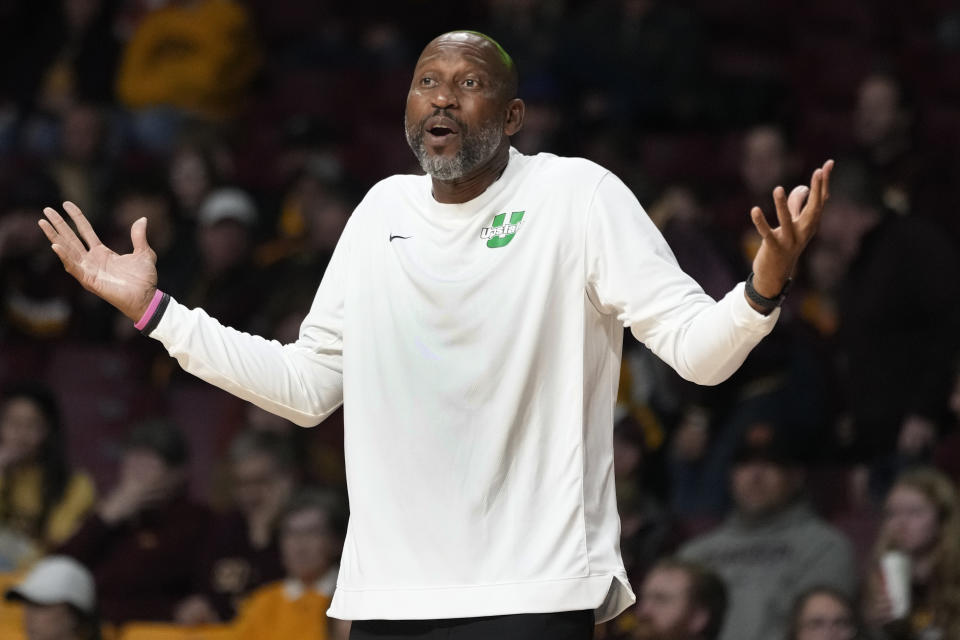 USC Upstate head coach Dave Dickerson gestures toward a referee during the first half of an NCAA college basketball game against Minnesota, Saturday, Nov. 18, 2023, in Minneapolis. (AP Photo/Abbie Parr)