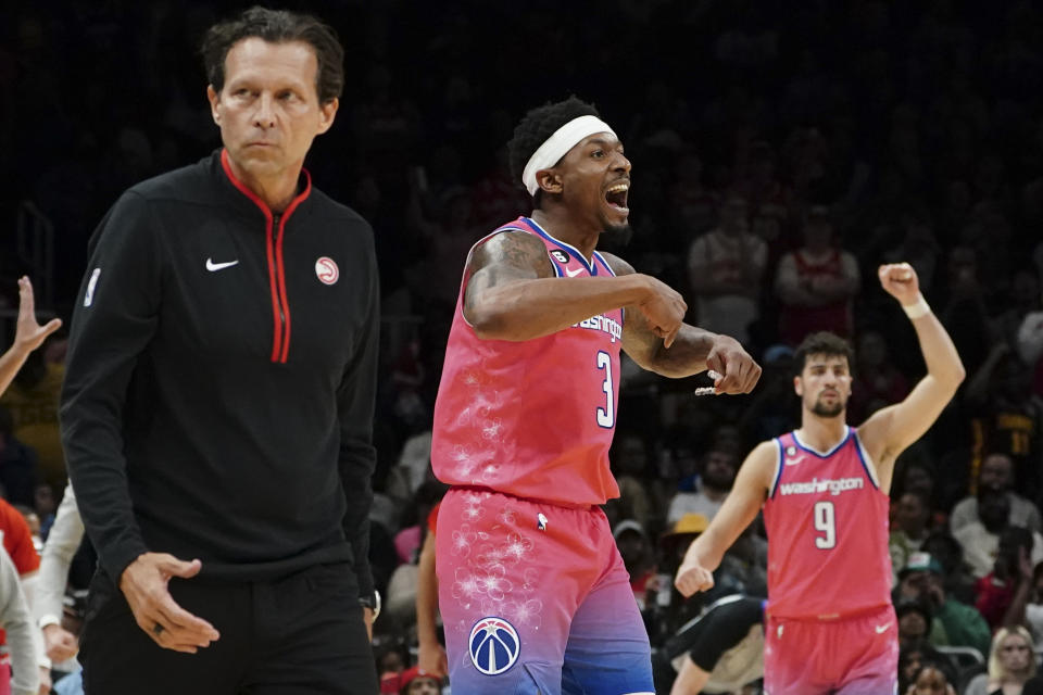 Washington Wizards guard Bradley Beal (3) reacts after a basket in the final seconds of an NBA basketball game against the Atlanta Hawks Tuesday, Feb. 28, 2023, in Atlanta. (AP Photo/John Bazemore)