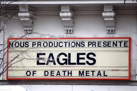 An advertising board for the music band The Eagles of Death Metal is seen at the entrance of the Bataclan concert hall, one of the sites of the deadly attacks in Paris, France, November 21, 2015. REUTERS/Charles Platiau