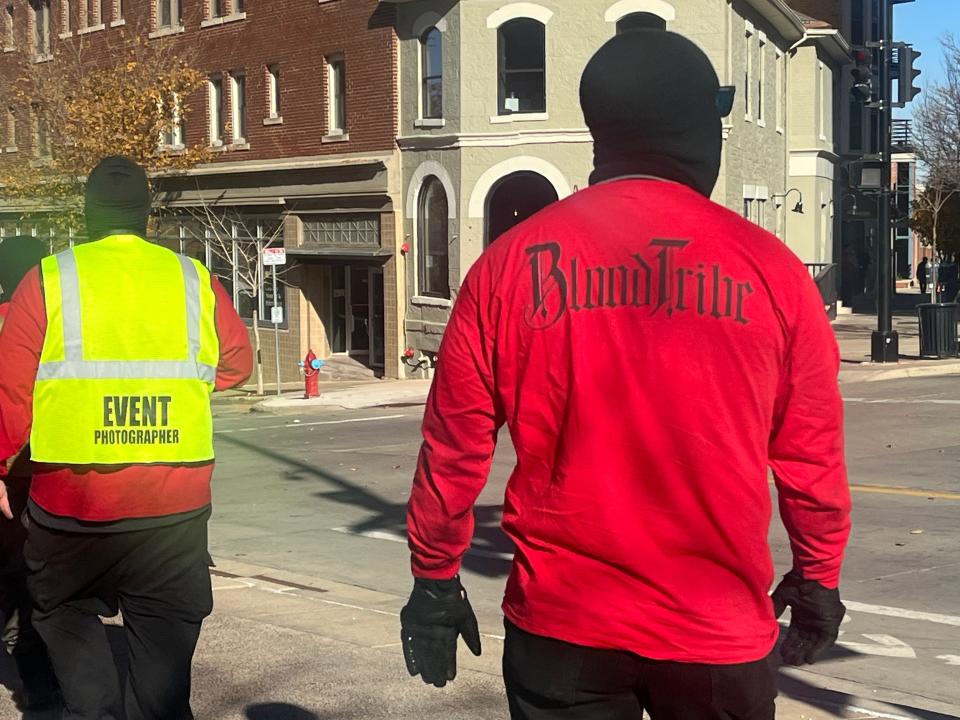 Members of neo-Nazi group "Blood Tribe" march in downtown Madison on Saturday, Nov. 18, 2023.