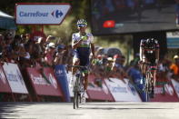 Orica GreenEdge rider Esteban Chaves of Colombia crosses the finish line to win the 158.7 km (98.6 miles) 2nd stage of the Vuelta Tour of Spain cycling race from Alhaurin de la Torre to Caminito del Rey, in Ardales, southern Spain, August 23, 2015. REUTERS/Jon Nazca