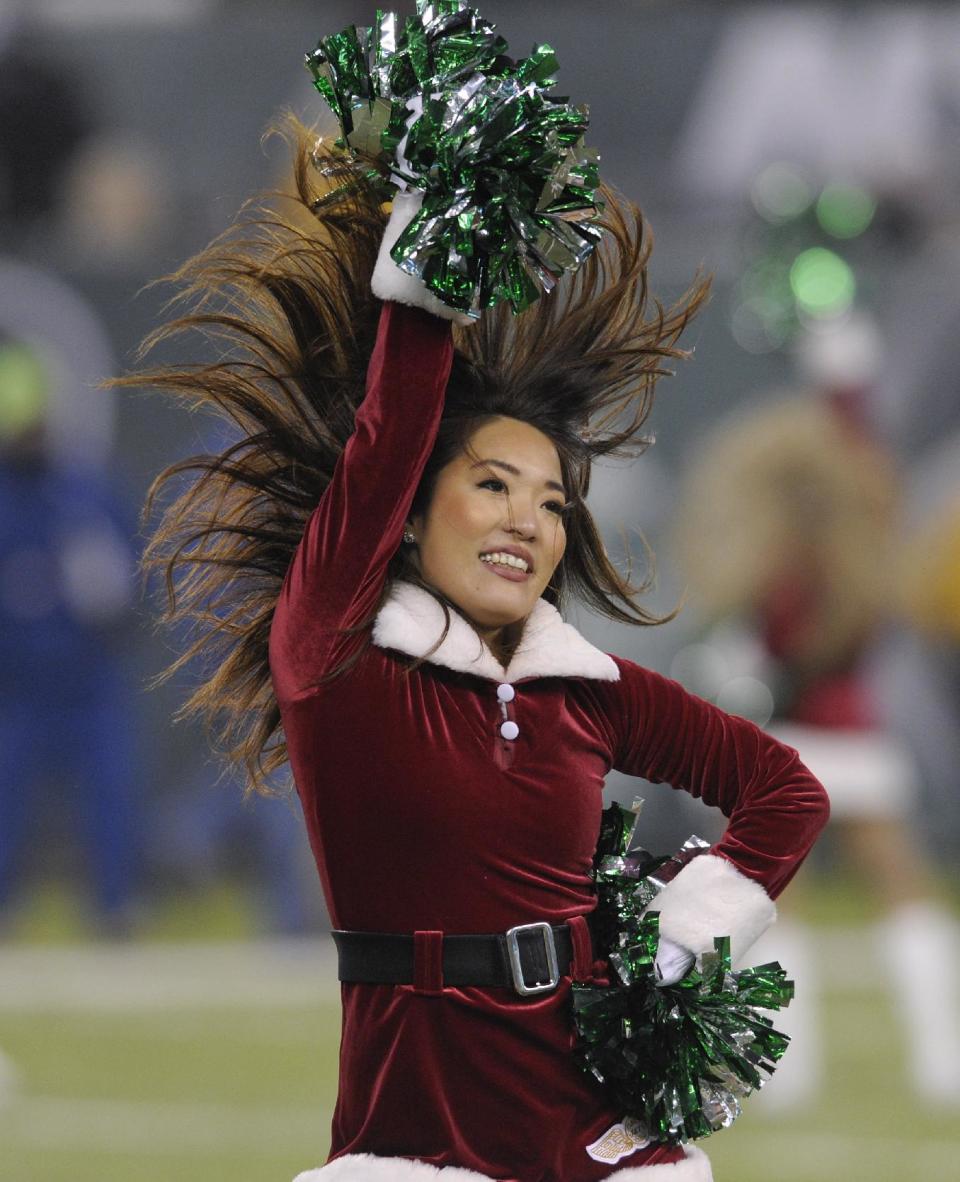 <p>A New York Jets cheerleader performs during an NFL football game between the New York Jets and the Miami Dolphins, Saturday, Dec. 17, 2016, in East Rutherford, N.J. (AP Photo/Bill Kostroun) </p>