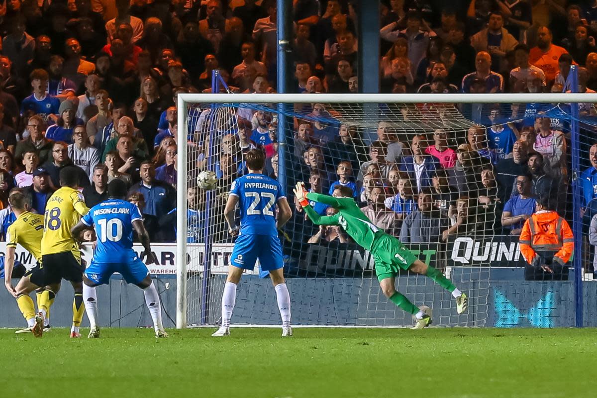 Jamie Cumming saves from Josh Knight deep in stoppage time <i>(Image: Simon Hall)</i>