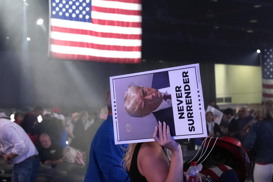 FILE - People leave after Republican presidential candidate former President Donald Trump spoke at the "People's Convention" of Turning Point Action June 15, 2024 in Detroit. Both presidential campaigns this year have embraced digital memes, the lingua franca of social media. (AP Photo/Carlos Osorio)