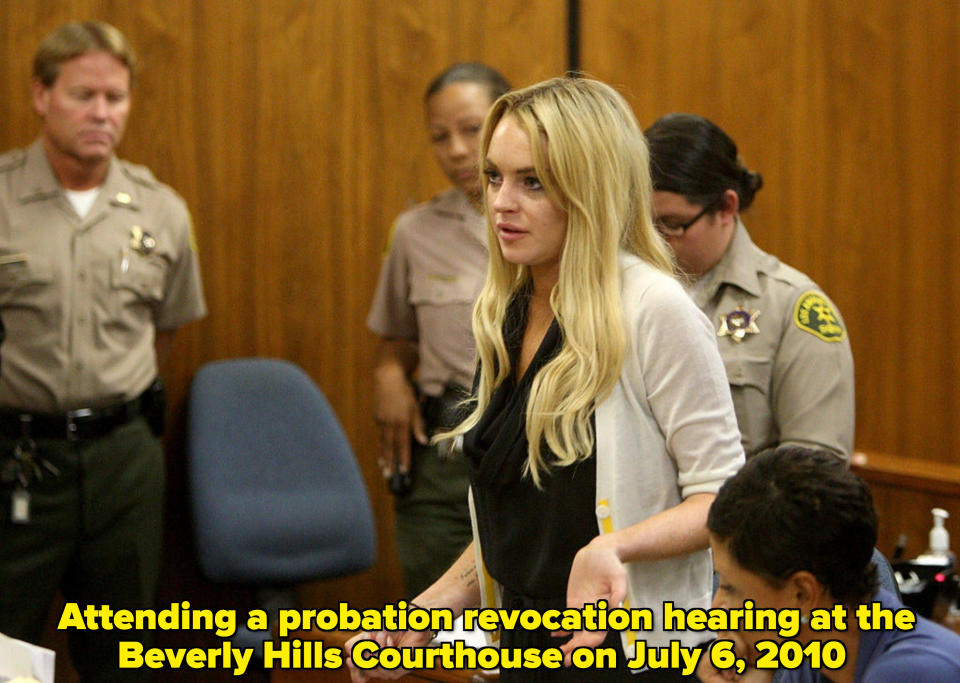 Lohan standing in a courtroom