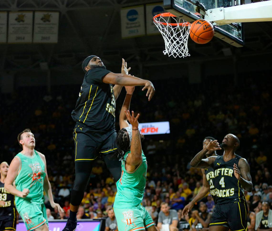 Shaq Morris of the Aftershocks blocks a shot against We Are D3 during the second half of their TBT game on Friday night at Koch Arena.