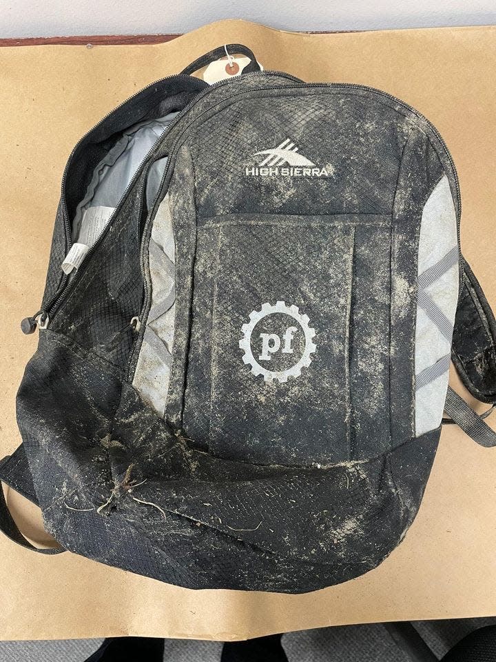 A backpack found on Feb. 15, 2024. Inside, someone found a deceased puppy and a concrete block.