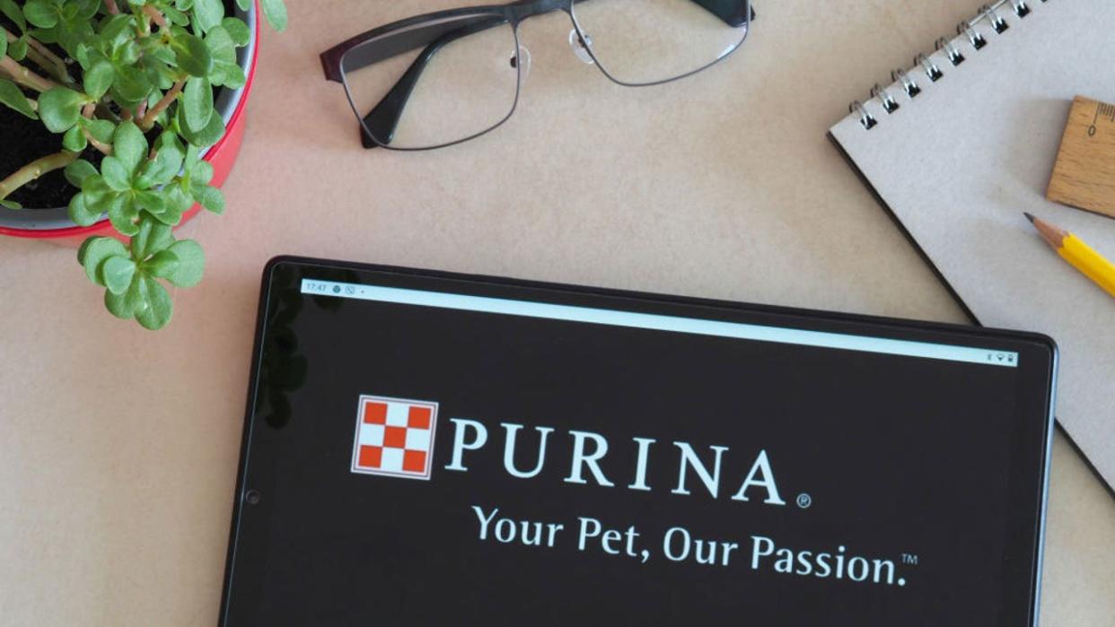 <div>GERMANY - 2022/07/05: In this photo illustration, Nestle Purina Petcare, or simply Purina logo is displayed on a tablet. (Photo Illustration by Igor Golovniov/SOPA Images/LightRocket via Getty Images)</div>