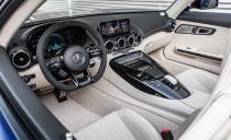 <p>Standard interior touches include the new AMG Performance flat-bottom steering wheel and the AMG Night package, which brings high-gloss black shift paddles, steering-wheel spokes, and seat insert.</p>