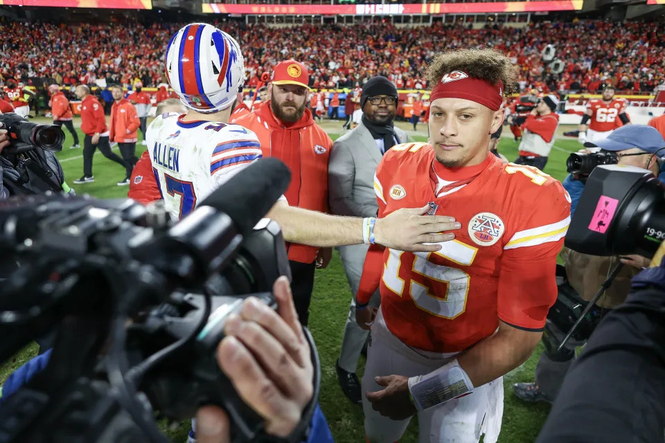 KANSAS CITY, MISSOURI - DECEMBER 10: Patrick Mahomes #15 of the Kansas City Chiefs reacts with Josh Allen #17 of the Buffalo Bills after the game at GEHA Field at Arrowhead Stadium on December 10, 2023 in Kansas City, Missouri. (Photo by Jamie Squire/Getty Images)