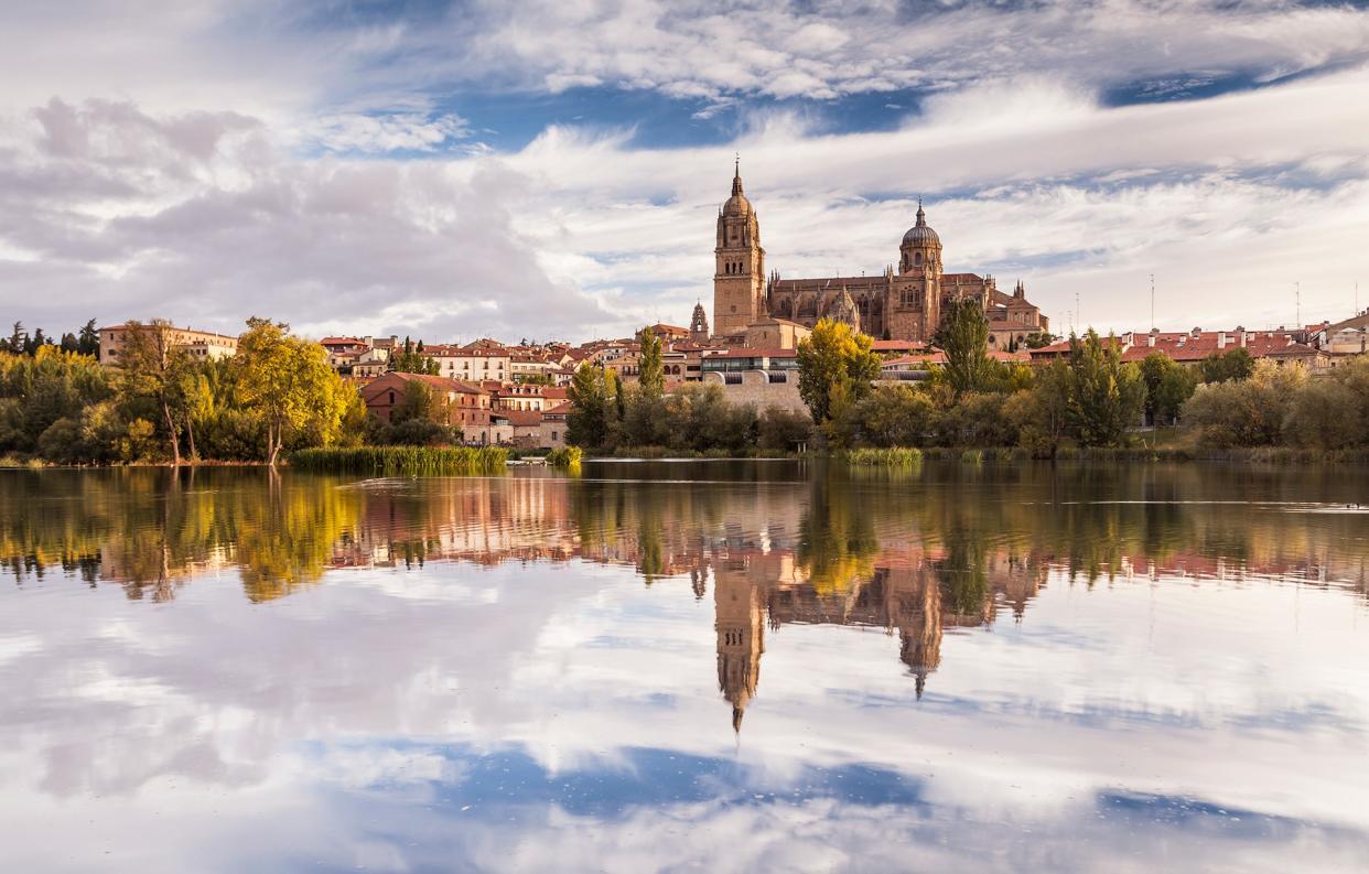 Salamanca's Nueva Cathedral from across the River Tormés - Copyright: Julian Elliott Photography