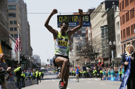 Lemi Berhanu Hayle of Ethiopia crosses the finish line to win the men?s division of the 120th running of the Boston Marathon in Boston, Massachusetts April 18, 2016. REUTERS/Brian Snyder -