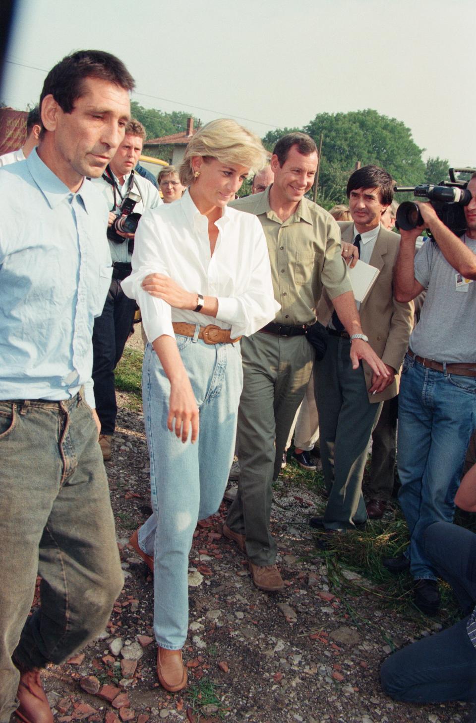 princess diana wearing jeans and a white button down