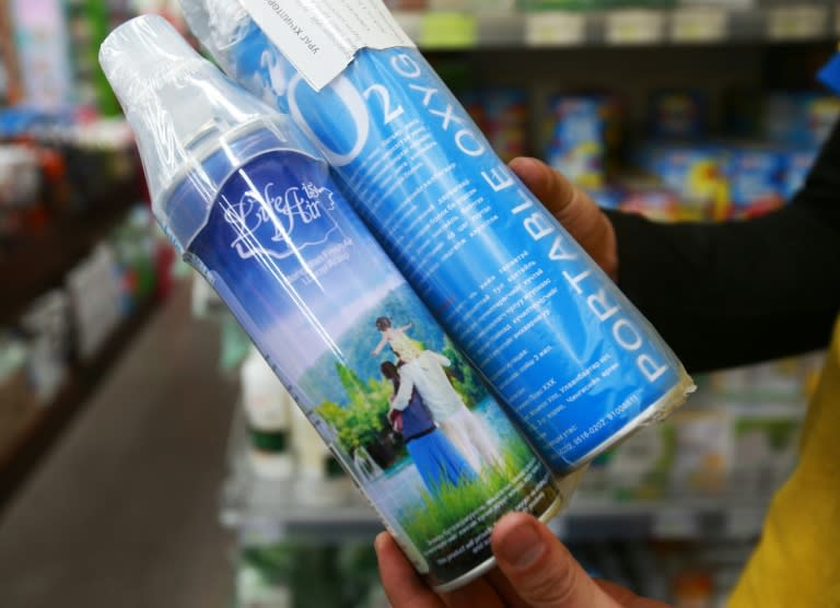 A customer buys 'oxygen cocktails' at a store in Ulaanbaatar