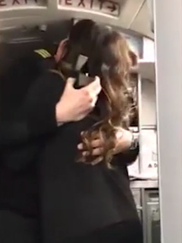 Lauren and Jon have a hug before getting back to work. Source: Storyful