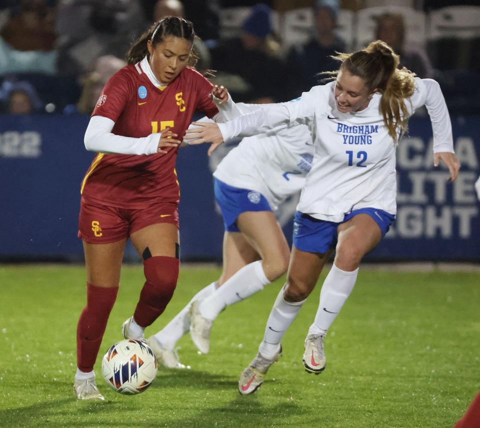 BYU midfielder Jamie Shepherd (12) and USC forward Maribel Flores (15) during the second round of the NCAA championship in Provo on Thursday, Nov. 16, 2023. BYU won 1-0. | Jeffrey D. Allred, Deseret News