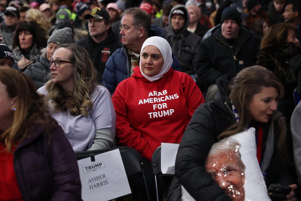 Rola Makki, of Dearborn, vice president of outreach for the Michigan GOP, was at a Donald Trump rally on Feb. 17, 2024, in Waterford, Michigan, wearing a red pullover that read in white letters: "Arab Americans for Trump." People waited in lines for hours outside the event as temperatures held in the mid-20s and a strong wind cut through the crowd.