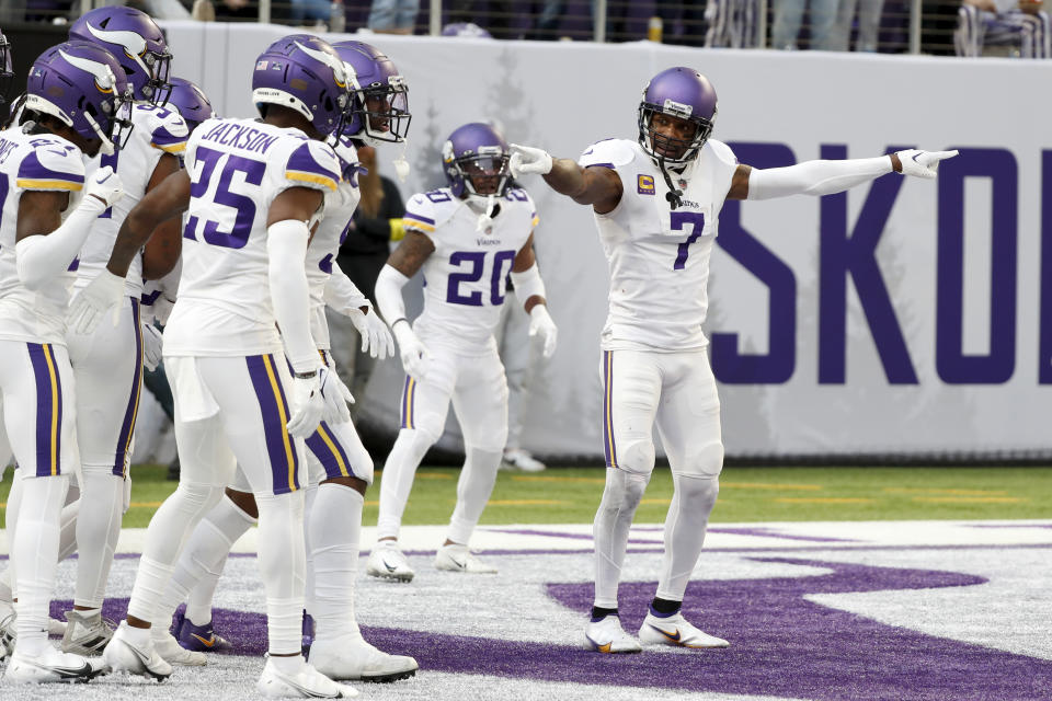 Minnesota Vikings cornerback Patrick Peterson (7) celebrates with teammates after intercepting a pass during the second half of an NFL football game against the New York Giants, Saturday, Dec. 24, 2022, in Minneapolis. (AP Photo/Bruce Kluckhohn)