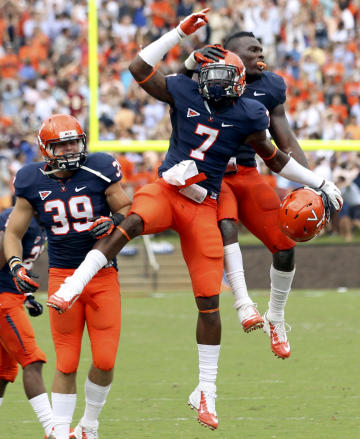 Eli Harold (AP Photo/Andrew Shurtleff, File)