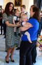 <p>Kate donned a printed knit dress by Tory Burch for Prince George’s playdate. She teamed the look with simple black pumps by Jimmy Choo. </p><p><i>[Photo: PA]</i></p>