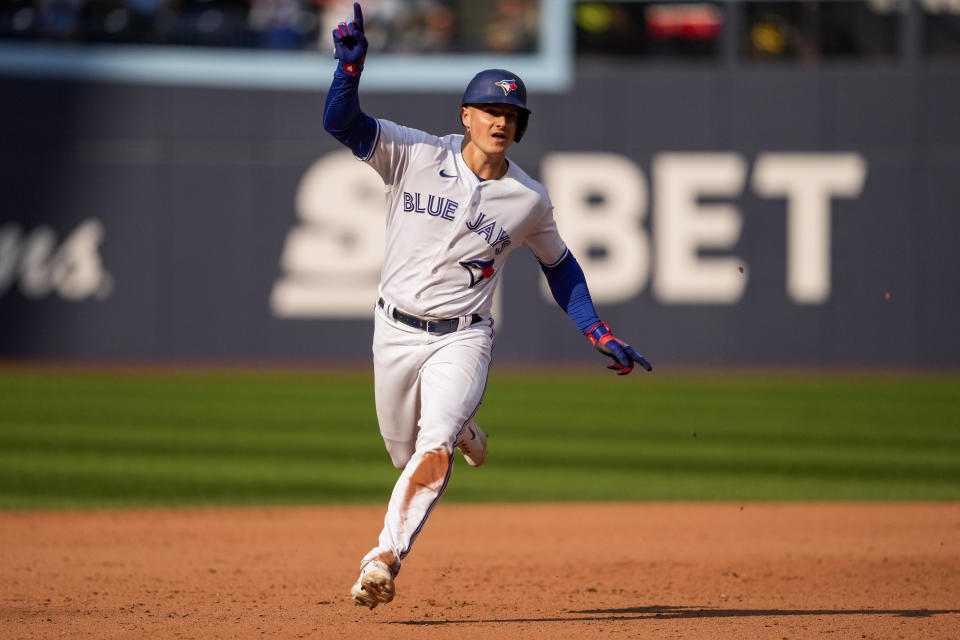 Toronto Blue Jays' Matt Chapman celebrates after his walkoff double against the Boston Red Sox during ninth-inning baseball game action in Toronto, Sunday, Sept. 17, 2023. (Andrew Lahodynskyj/The Canadian Press via AP)