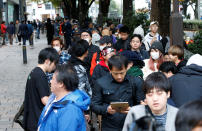 <p>Customers wait in queue for the release of Apple’s new iPhone X outside the Apple Store in Tokyo’s Omotesando shopping district, Japan, November 3, 2017. REUTERS/Toru Hanai </p>