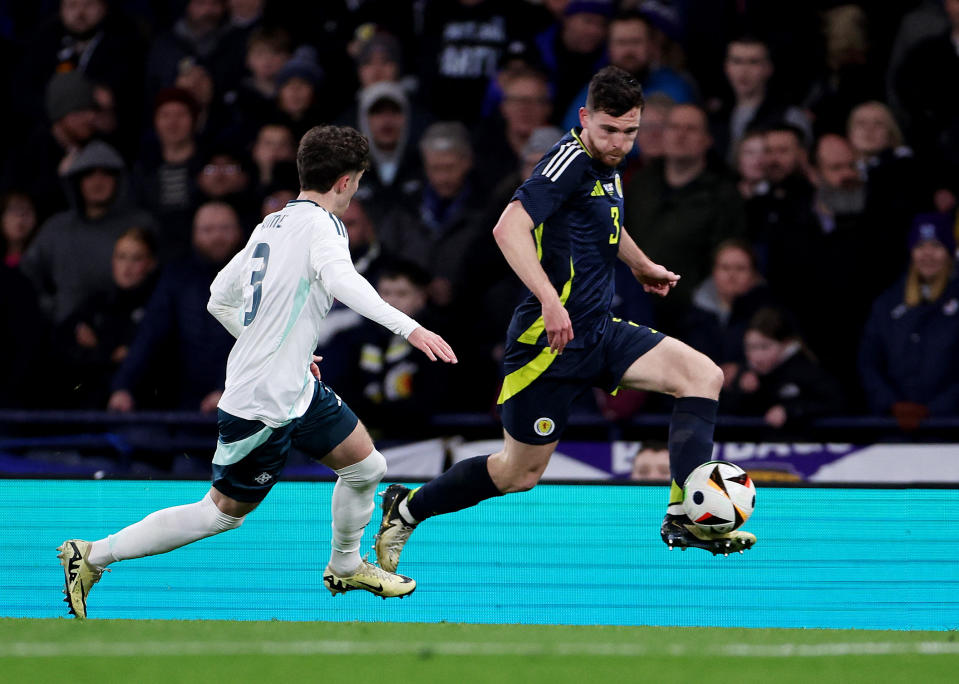 Andy Robertson in action against Northern Ireland before he was forced off in the first half (REUTERS/Russell Cheyne)