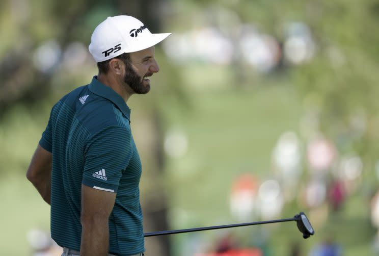 Dustin Johnson is questionable to play in the Masters after hurting his back in a fall. (AP)