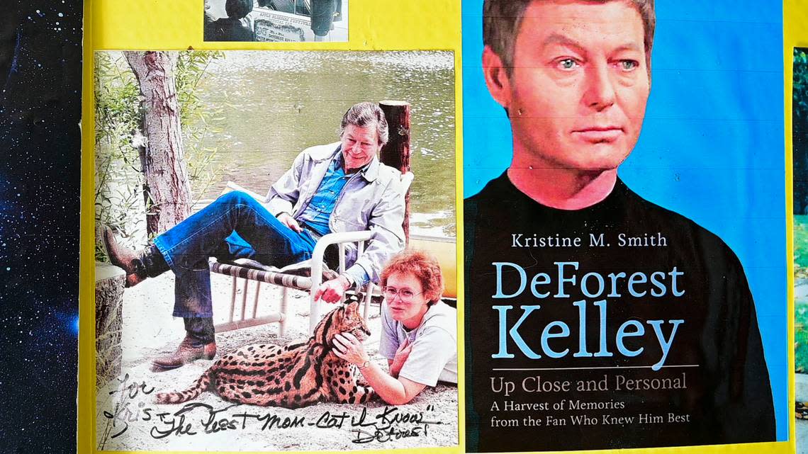 Kris M. Smith is seen with DeForest Kelley in a picture that was given to her by Kelley alongside the cover the book she wrote about the actor who played Dr. Leonard “Bones” McCoy on the original Star Trek series.
