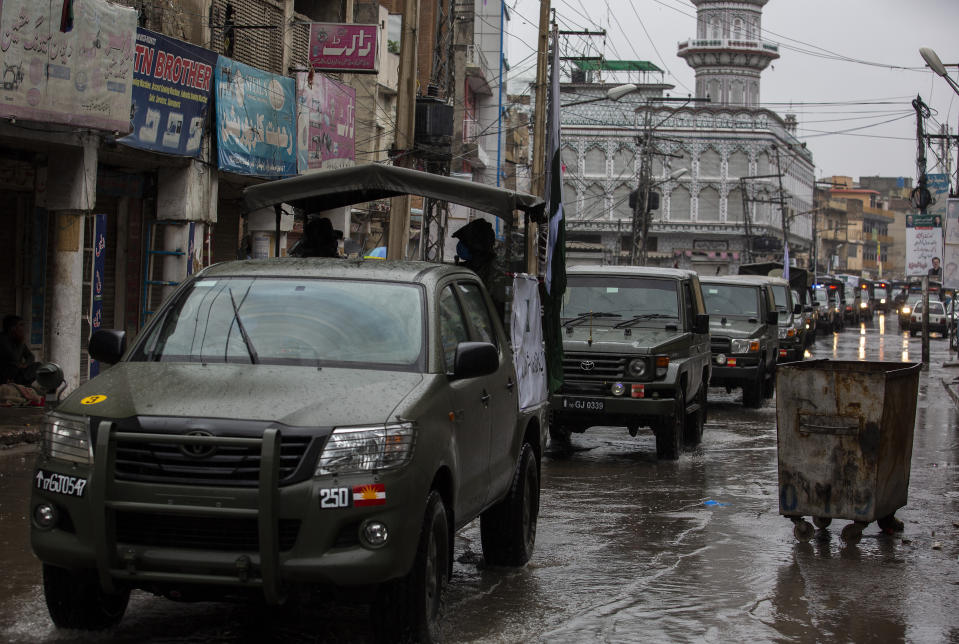 Pakistani soldiers patrol outside a mosque in Rawalpindi, Pakistan, Friday, March 27, 2020. Authorities imposed nation-wide lockdown appealed people to avoid public gatherings like Friday congregations and offer their prayers at home as a preventive measures to contain the spread of coronavirus. The virus causes mild or moderate symptoms for most people, but for some, especially older adults and people with existing health problems, it can cause more severe illness or death. (AP Photo/B.K. Bangash)