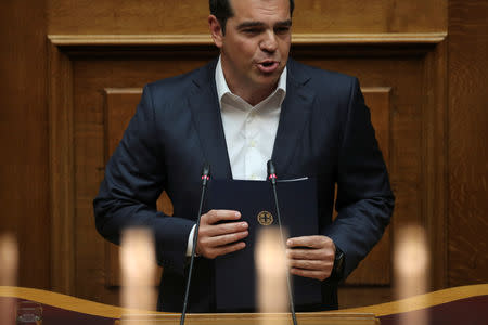 Greek Prime Minister Alexis Tsipras addresses lawmakers during a parliamentary session before a vote on tax breaks in Athens, Greece, May 15, 2019. REUTERS/Alkis Konstantinidis