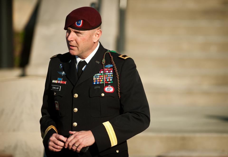 FILE - In this Tuesday, Jan. 22, 2013, file photo, Army Brig. Gen. Jeffrey A. Sinclair leaves a Fort Bragg, N.C., courthouse after he deferred entering a plea at his arraignment on charges of fraud, forcible sodomy, coercion and inappropriate relationships. Sinclair, 51, faces a maximum sentence of life in prison at a court-martial scheduled to begin March 3. (AP Photo/The Fayetteville Observer, Andrew Craft, File)