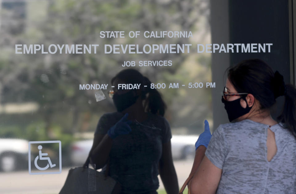 CANOGA PARK, CA - MAY 14: Maria Mora came to find information about her claim but found the California State Employment Development Department was closed due to coronavirus concerns on Thursday, May 14, 2020 in Canoga Park, CA. (Brian van der Brug / Los Angeles Times via Getty Images)
