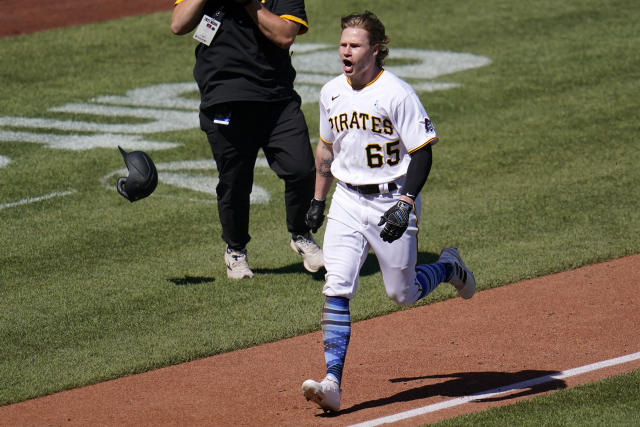 Pittsburgh Pirates' Jack Suwinski celebrates as he rounds third base after hitting a walkoff solo home run off San Francisco Giants relief pitcher Tyler Rogers during the ninth inning of a baseball game in Pittsburgh, Sunday, June 19, 2022. It was Suwinski's third solo home run of the game. (AP Photo/Gene J. Puskar)