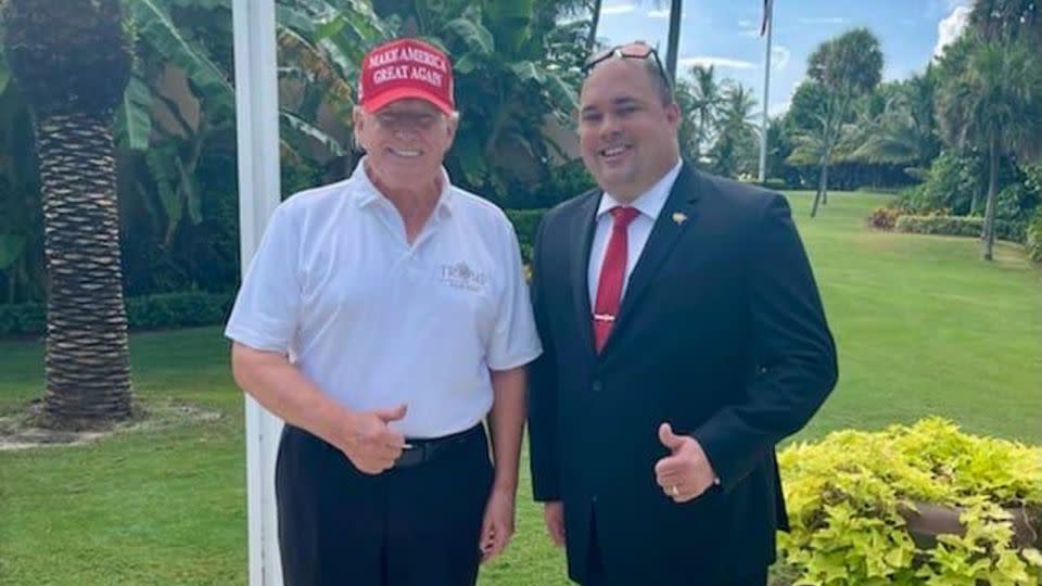 Former President Donald Trump and Brian Butler, right, pose for a photo in July 2022 at Mar-a-Lago in Palm Beach, Florida. - Obtained by CNN
