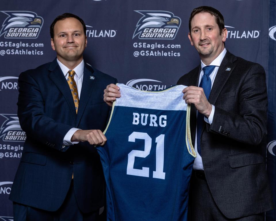 Brian Burg, right, new head coach of the Georgia Southern men's basketball team, and new director of athletics Jared Benko.