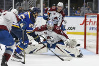 Colorado Avalanche goaltender Philipp Grubauer (31) prepares to block a shot on goal from St. Louis Blues' Jordan Kyrou (25) during the second period in Game 3 of an NHL hockey Stanley Cup first-round playoff series Friday, May 21, 2021, in St. Louis. (AP Photo/Scott Kane)