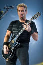 MOLINE, IL - APRIL 10: Ryan Peake and Chad Kroeger of Nickelback perform at the I Wireless Center on April 10, 2012 in Moline, Illinois. (Photo by Timothy Hiatt/Getty Images)