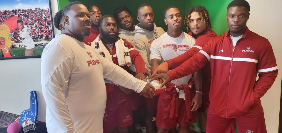 Virginia Union running backs pose for a group photo at the Pro Football Hall of Fame on Saturday.