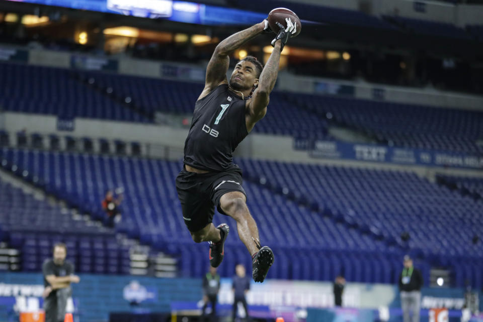 Ohio State defensive back Damon Arnette runs a drill at the NFL football scouting combine in Indianapolis, Sunday, March 1, 2020. (AP Photo/Michael Conroy)