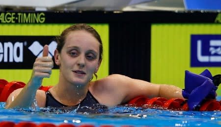 Francesca Halsall of Britain reacts after winning the women's 50m freestyle final at the European Swimming Championships in Berlin August 24, 2014. REUTERS/Michael Dalder