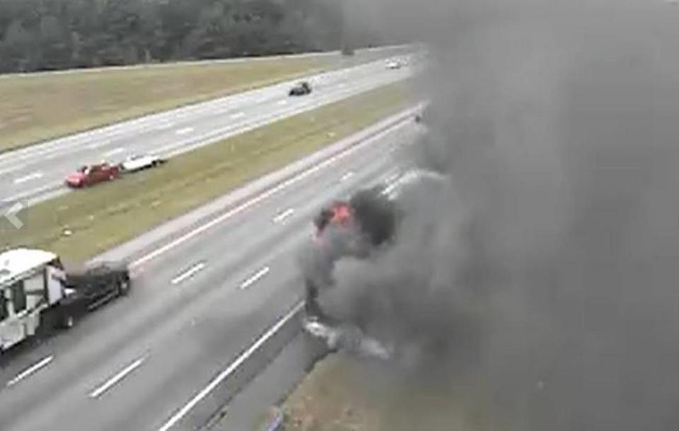 Fire and smoke could be seen coming from a burning vehicle on the interstate near Columbia.