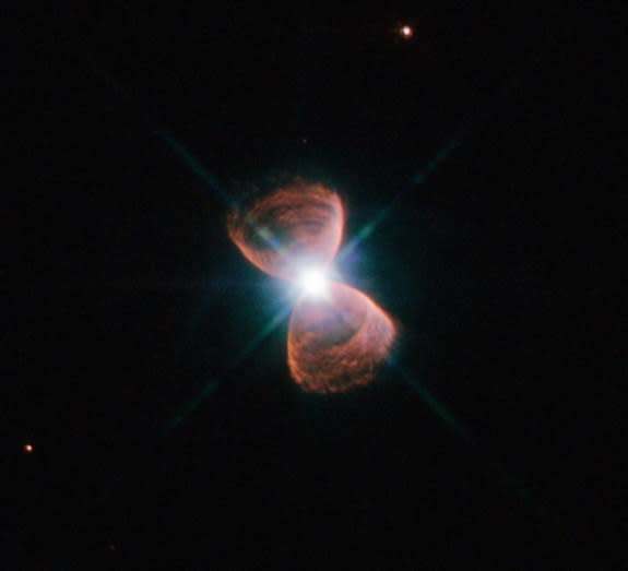 This image taken with the NASA/ESA Hubble Space Telescope shows an example of a bipolar planetary nebula. This object, which is known as Hubble 12 and also catalogued as PN G111.8-02.8, lies in the constellation of Cassiopeia.