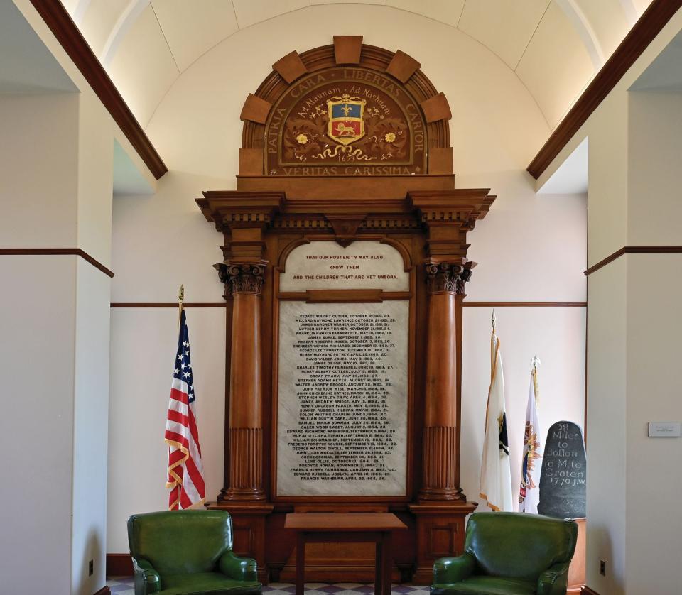 A large marble tablet in the Thayer Memorial Library's reference room bears the names of deceased Civil War soldiers.